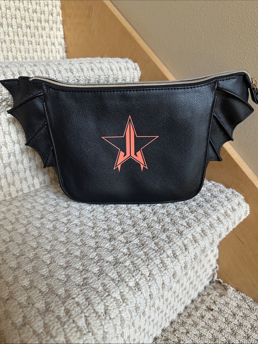 Jeffree Star Cosmetics bat-shaped makeup bag.